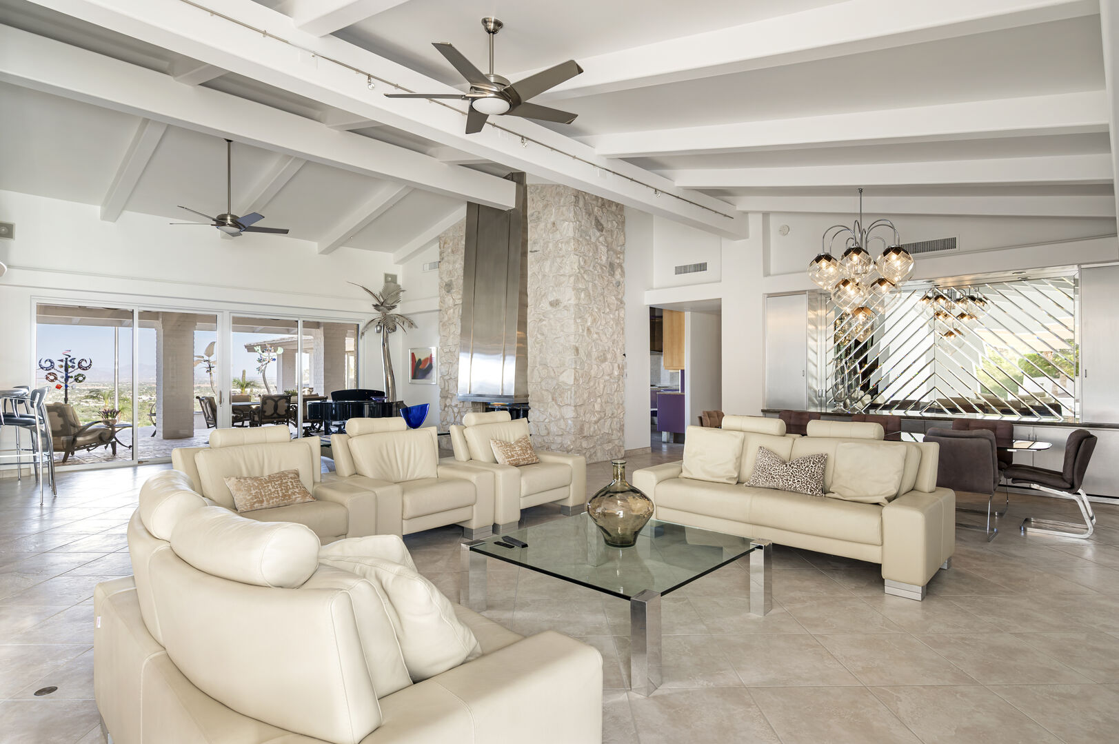 Bright open-concept living room with floor-to-ceiling windows